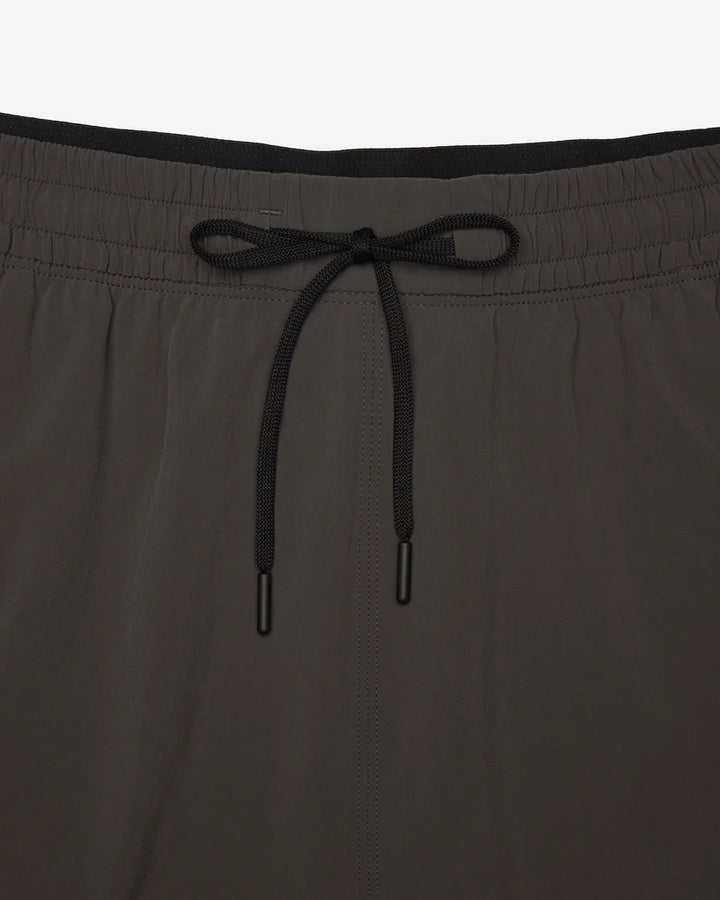 Reigning Champ 4-Way Stretch Nylon Standard Training Short 7” - Carbon